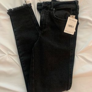 Free People high waisted black skinny jeans Size 27. Never worn